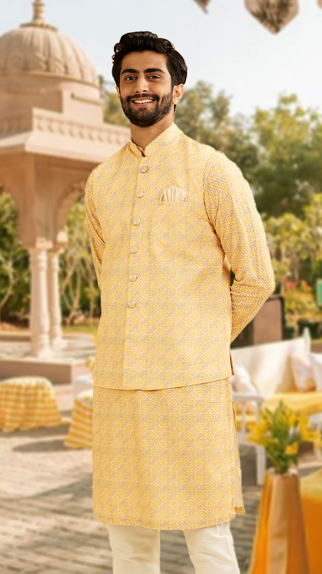 A man in yellow kurta jacket set for his haldi ceremony